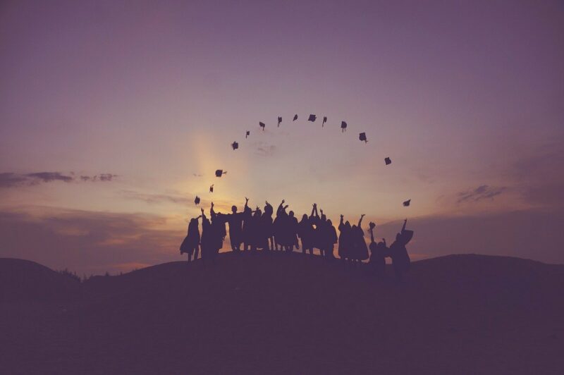 dawn graduates tossing hats