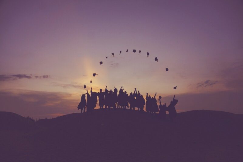 dawn graduates tossing hats