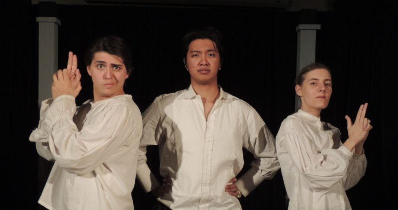 Three ACC drama students on stage
