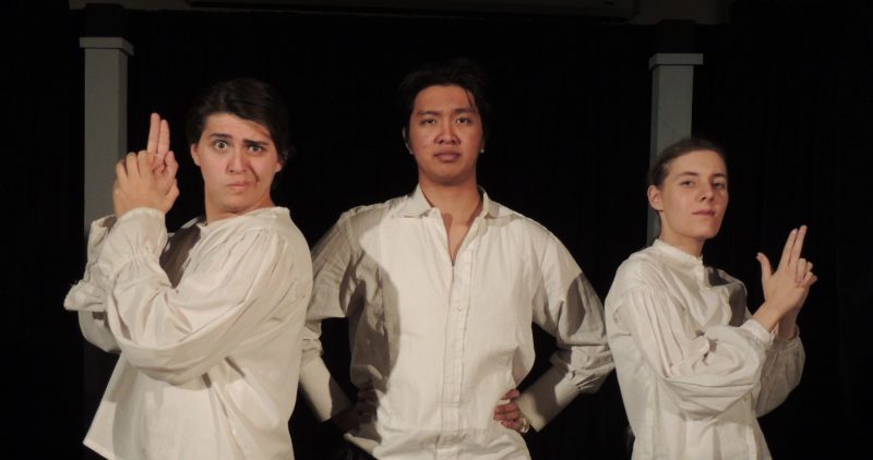 Three ACC drama students on stage