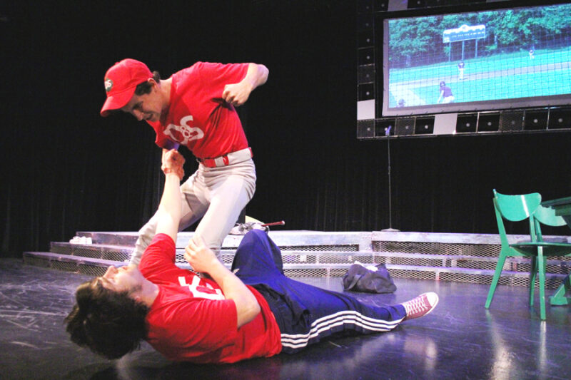 Drama students performing on stage