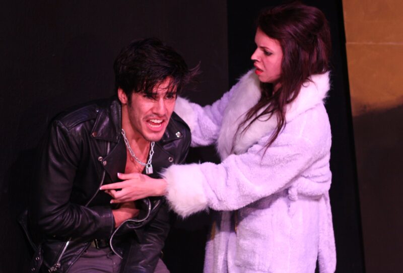 Drama students on stage performing