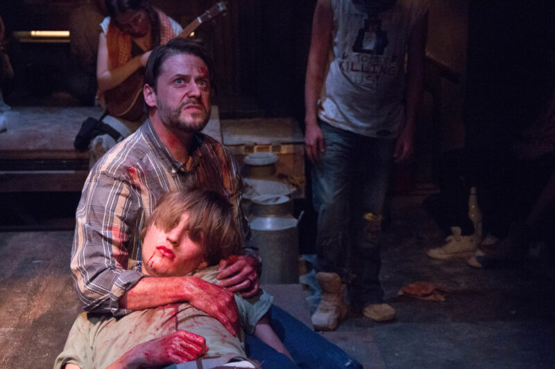 Drama students performing on stage