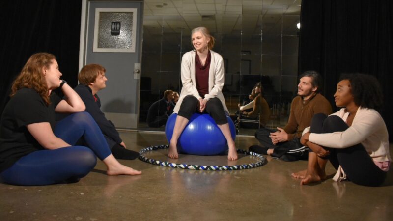 Drama students performing on stage