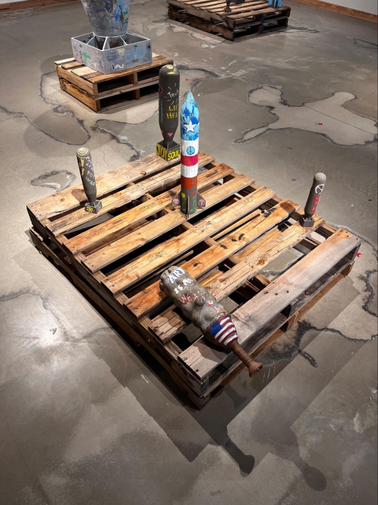 In addition to their collective mark-making, the participants returned the sculptures to their displays in different positions than where they were originally, further emphasizing the collaborative nature of the workshop.