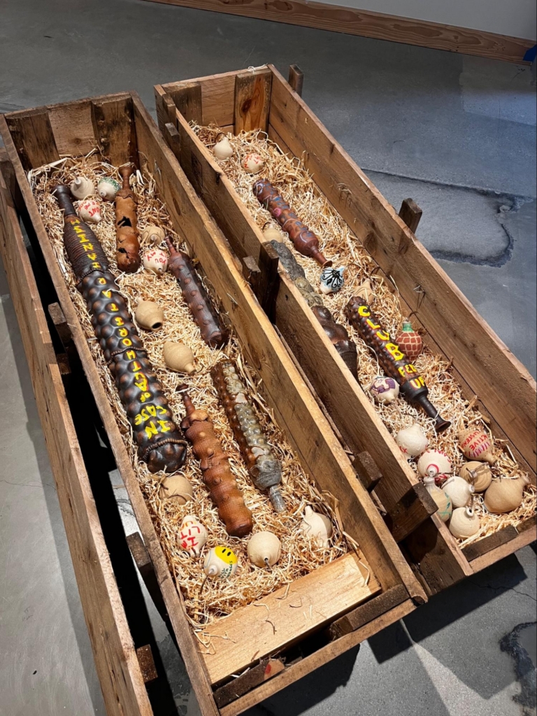 The once-unmarked ceramic sculptures are now accompanied by visual contributions from the workshop’s participants.