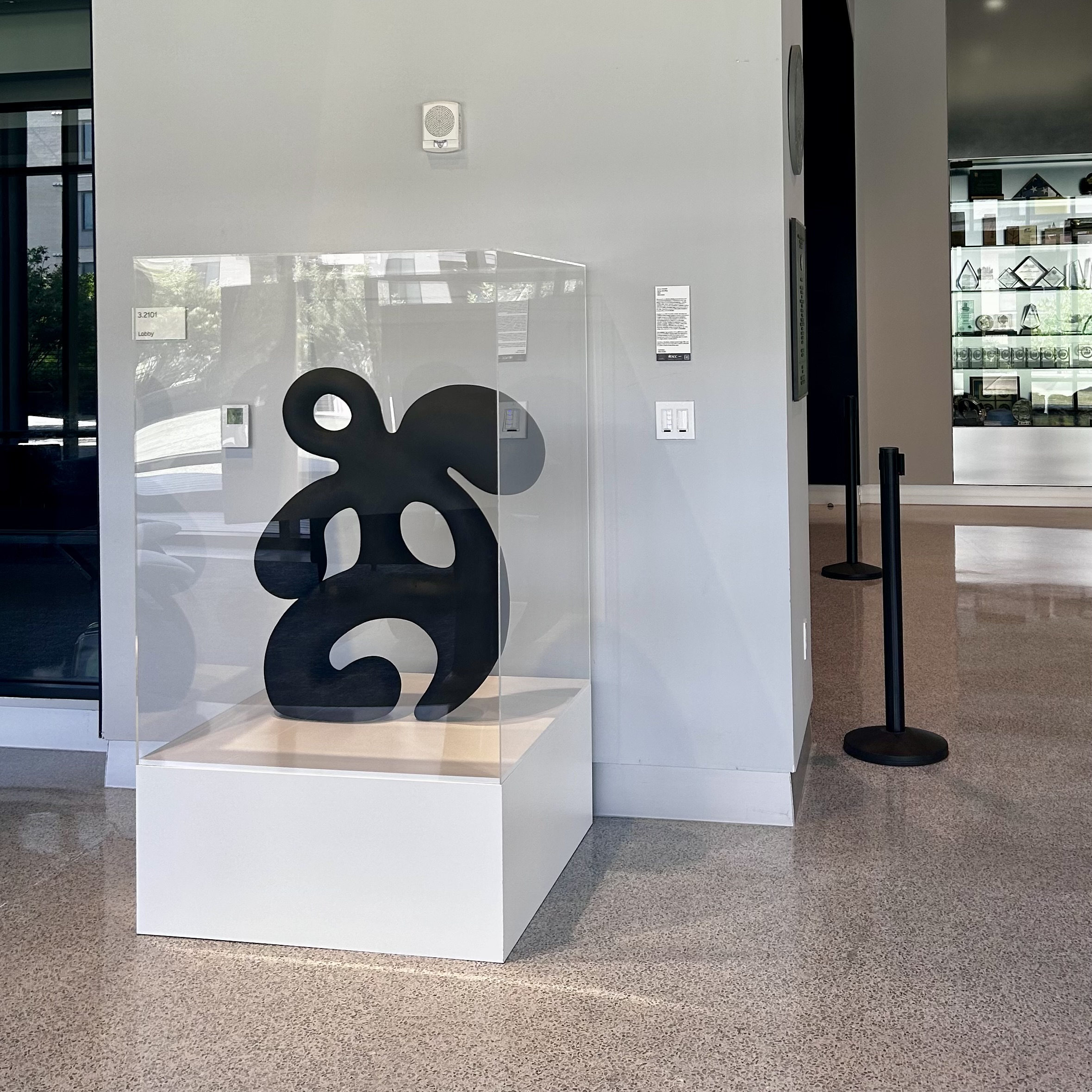 Image of Permanent Collection artwork on display in the ACC Highland campus, downstairs in the main lobby of building 3000.
